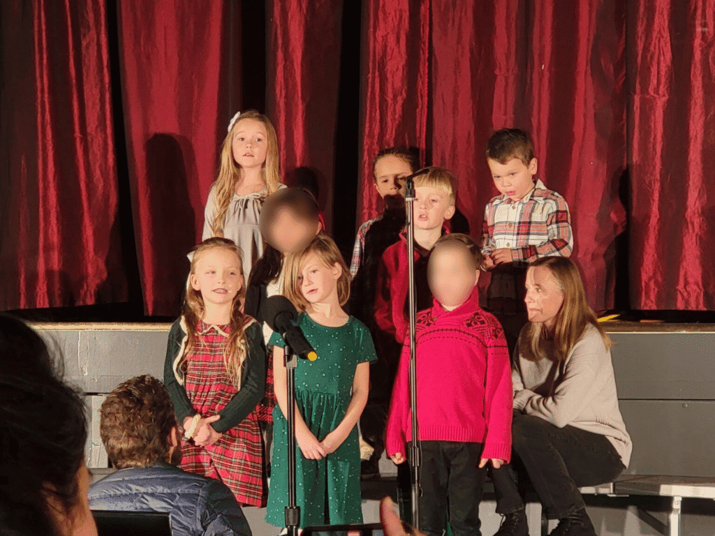 Students performing on stage at El Dorado Adventist School Christmas program.