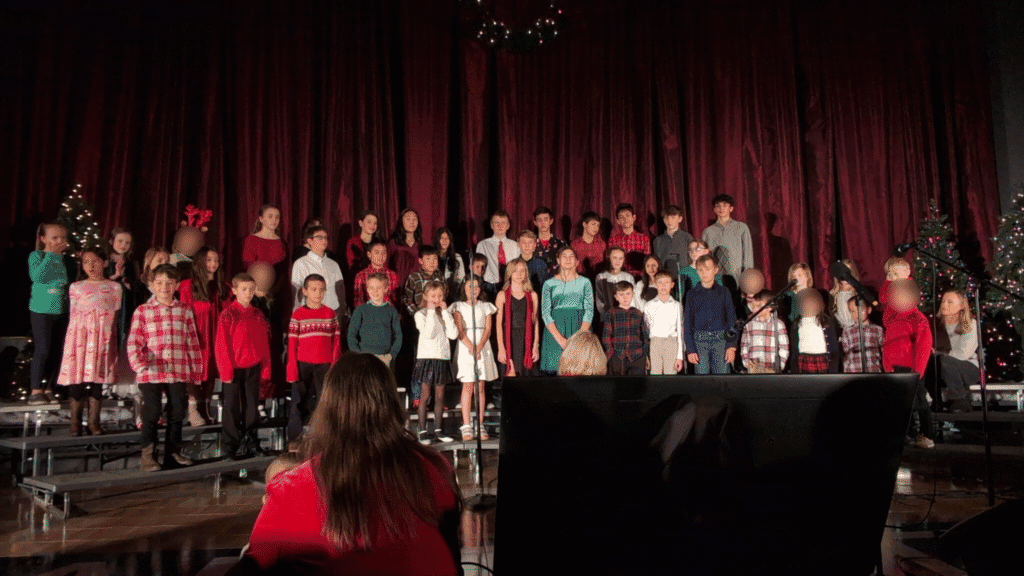 Cute school children performing on stage at El Dorado Adventist School Christmas concert.
