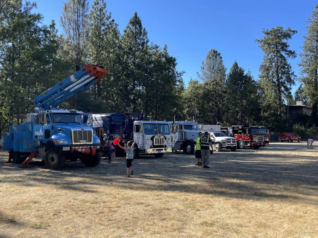 Fire trucks at El Dorado Adventist School showcasing emergency preparedness.