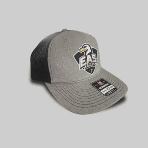 EAS Eagles logo on a gray and black trucker cap, representing El Dorado Adventist School apparel and accessories.