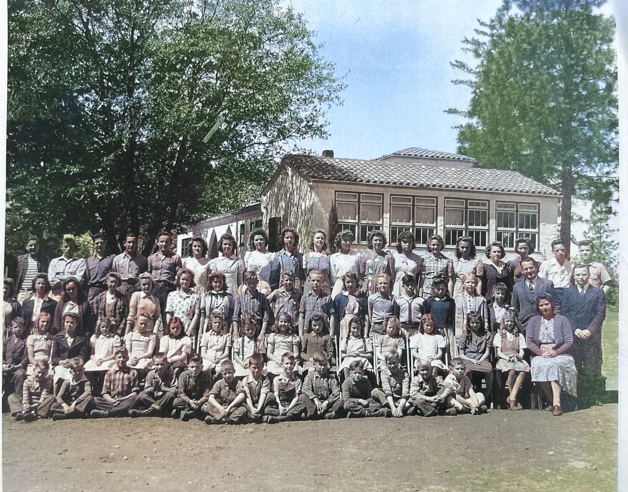 Group of students and teachers at El Dorado Adventist School, showcasing a historical school photo.